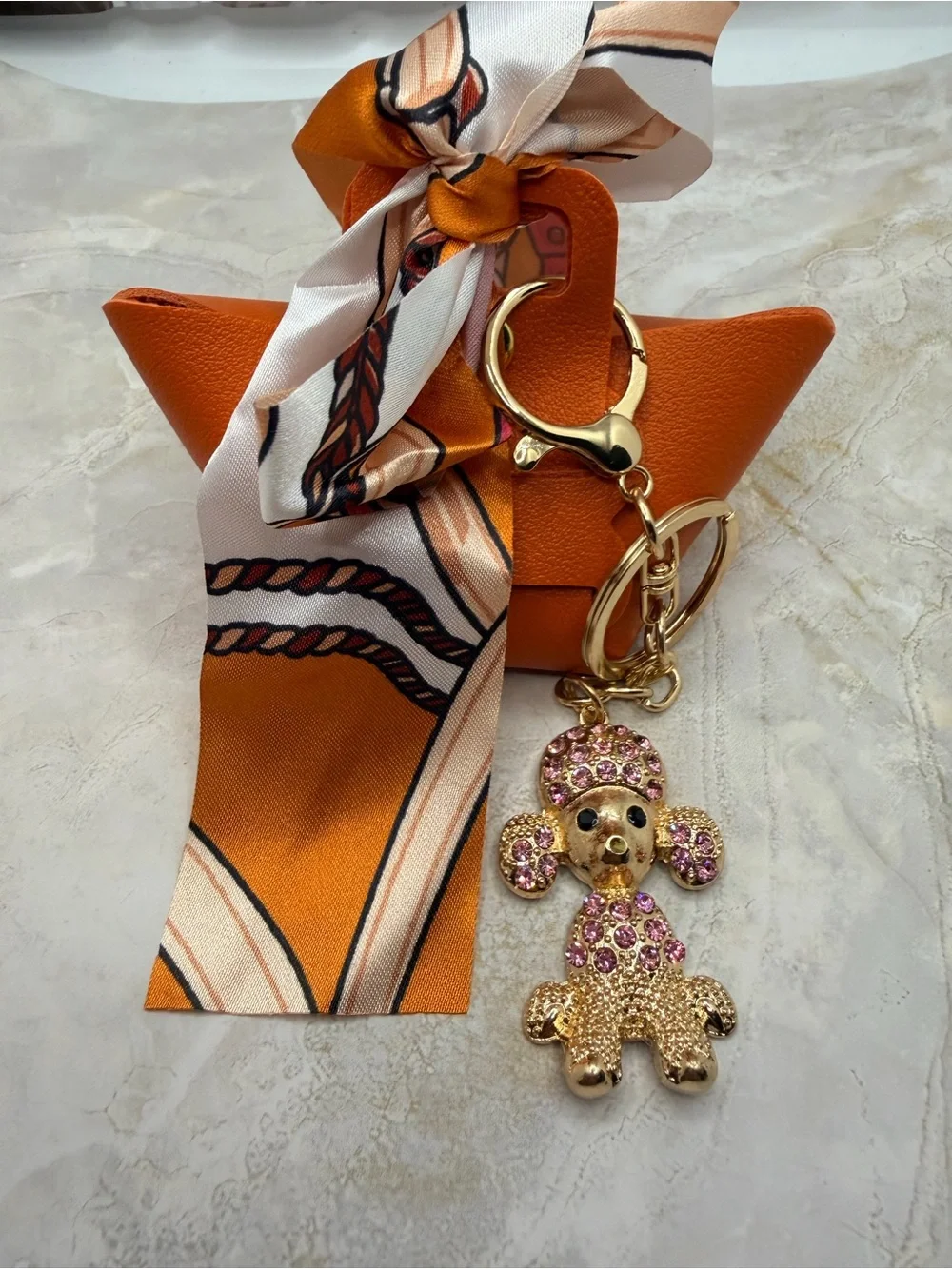 Orange Leather Mini Pouch with Gold-tone Pink Crystal Poodle Keychain